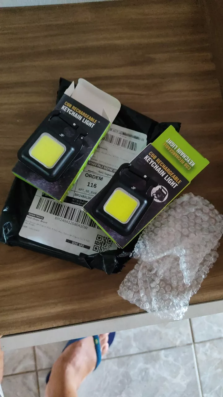 Mini Lanterna Led Portátil USB Recarregável Tática Abridor IZEFLASH PRO photo review