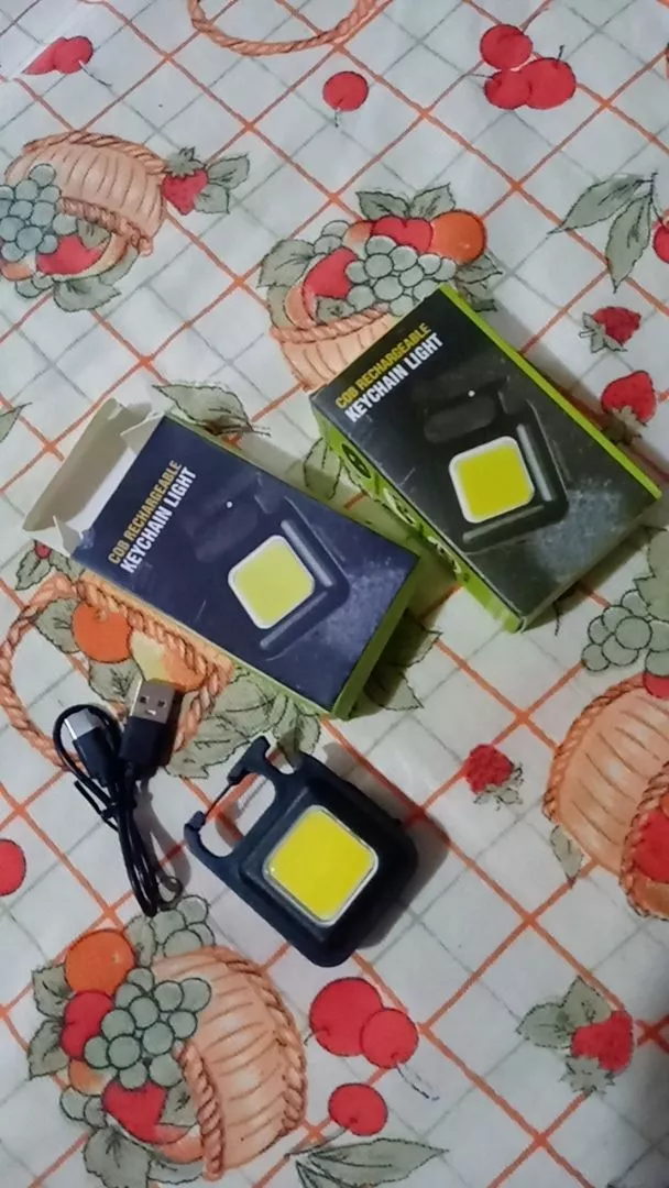 Mini Lanterna Led Portátil USB Recarregável Tática Abridor IZEFLASH PRO photo review
