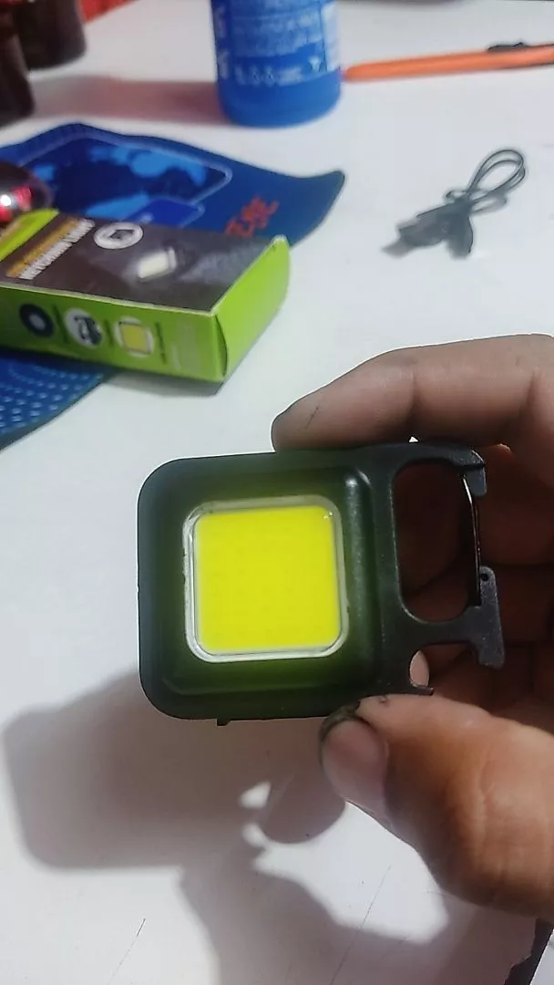 Mini Lanterna Led Portátil USB Recarregável Tática Abridor IZEFLASH PRO photo review