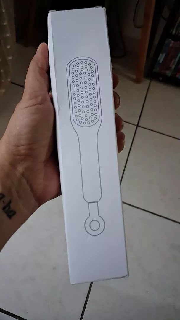 Pente Mágico Retrátil Antiestático Massagem Para Cabelos Lisos IZEHAIR FLEX photo review