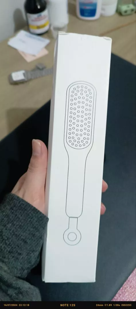 Pente Mágico Retrátil Antiestático Massagem Para Cabelos Lisos IZEHAIR FLEX photo review