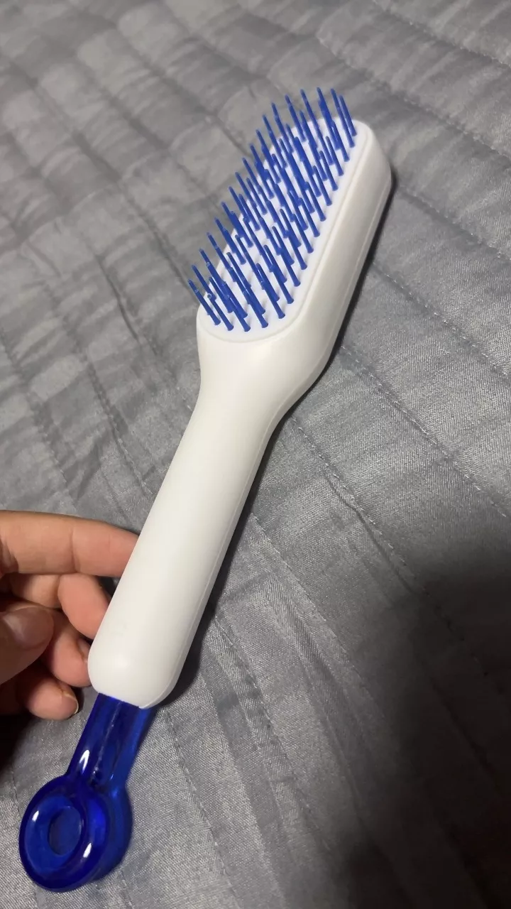 Pente Mágico Retrátil Antiestático Massagem Para Cabelos Lisos IZEHAIR FLEX photo review