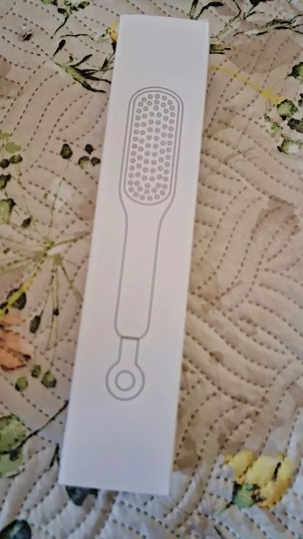 Pente Mágico Retrátil Antiestático Massagem Para Cabelos Lisos IZEHAIR FLEX photo review