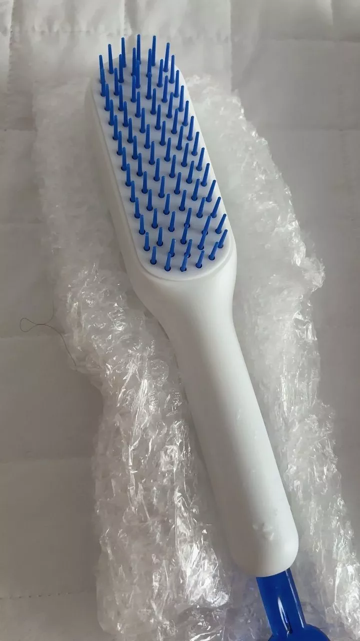 Pente Mágico Retrátil Antiestático Massagem Para Cabelos Lisos IZEHAIR FLEX photo review