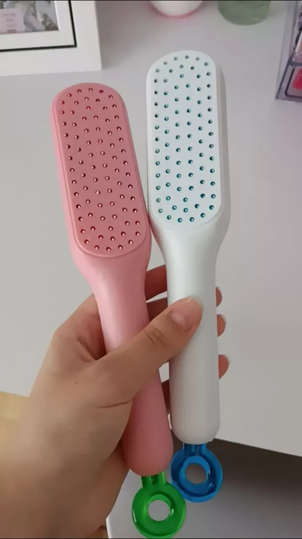Pente Mágico Retrátil Antiestático Massagem Para Cabelos Lisos IZEHAIR FLEX photo review