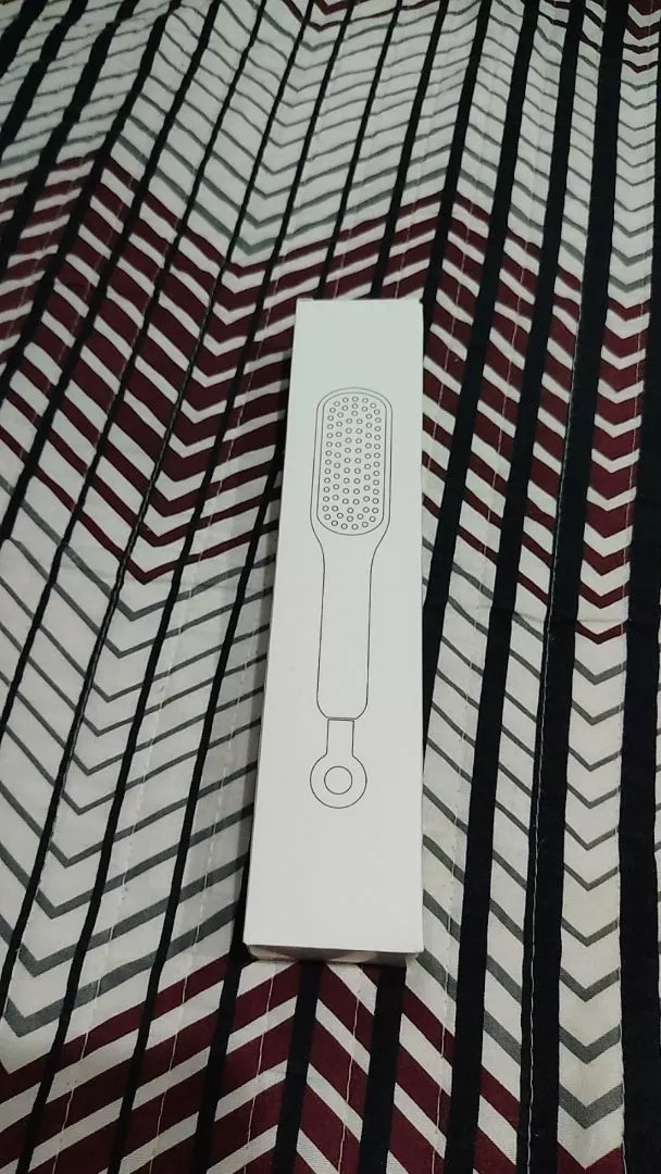 Pente Mágico Retrátil Antiestático Massagem Para Cabelos Lisos IZEHAIR FLEX photo review
