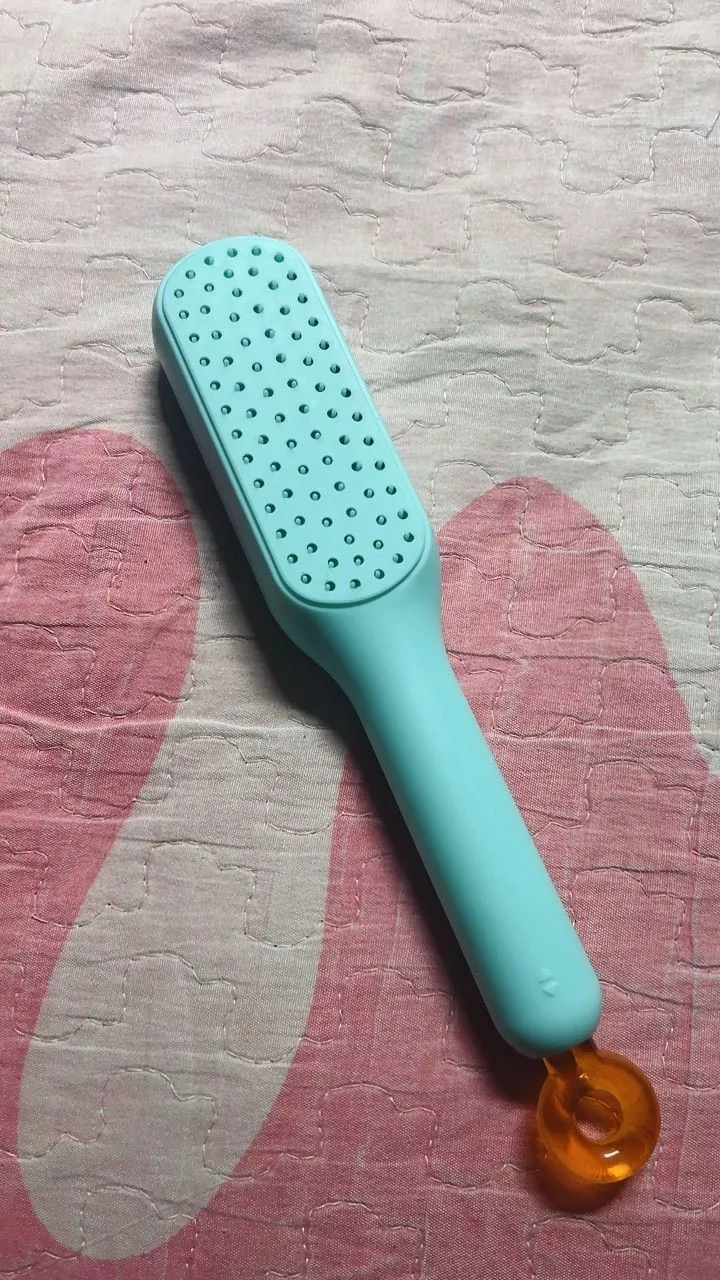 Pente Mágico Retrátil Antiestático Massagem Para Cabelos Lisos IZEHAIR FLEX photo review