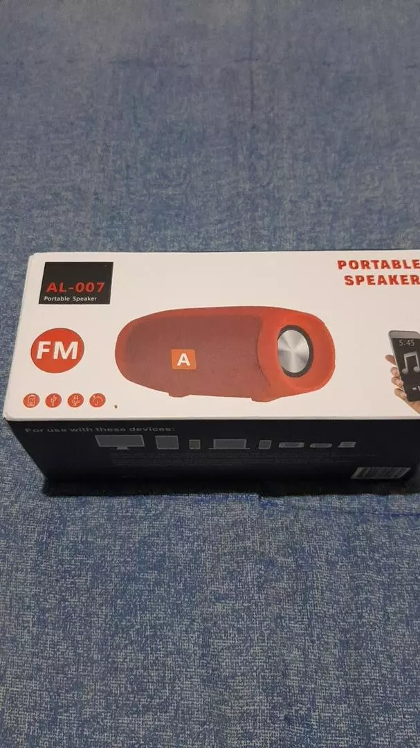 Caixa de Som Bluetooth Portátil 12h Bateria à Prova de Respingos IZELOUD MAX photo review