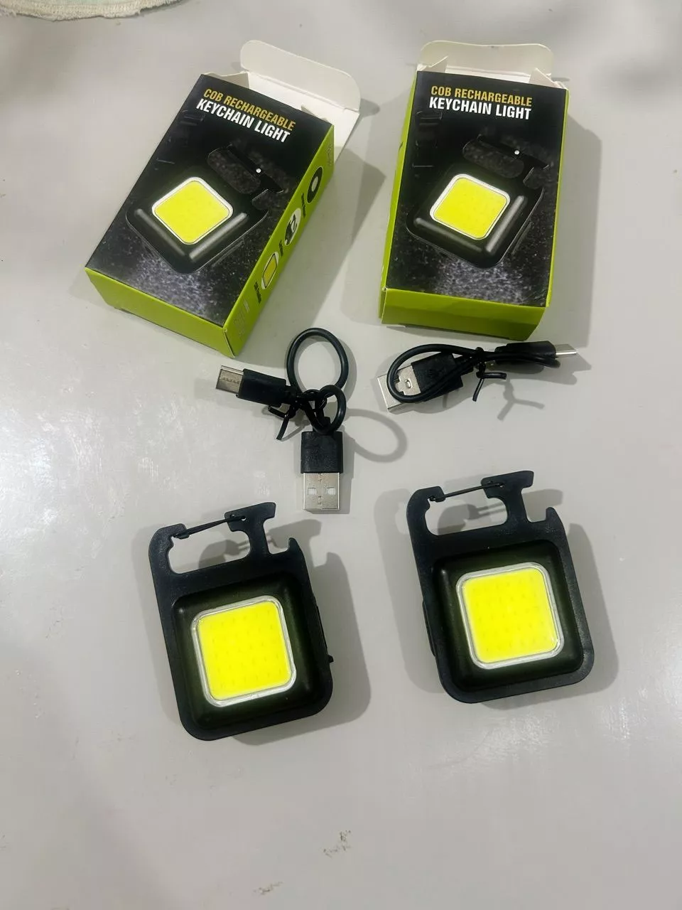 Mini Lanterna LED Portátil USB Recarregável 3 Modos com Abridor Resistente à Água IZEFLASH KEY photo review
