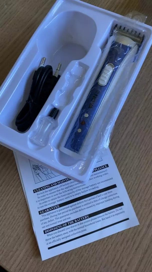 Máquina de Cortar Cabelo Sem Fio, Bivolt, Pente Regulável IZEBLADE PRO photo review